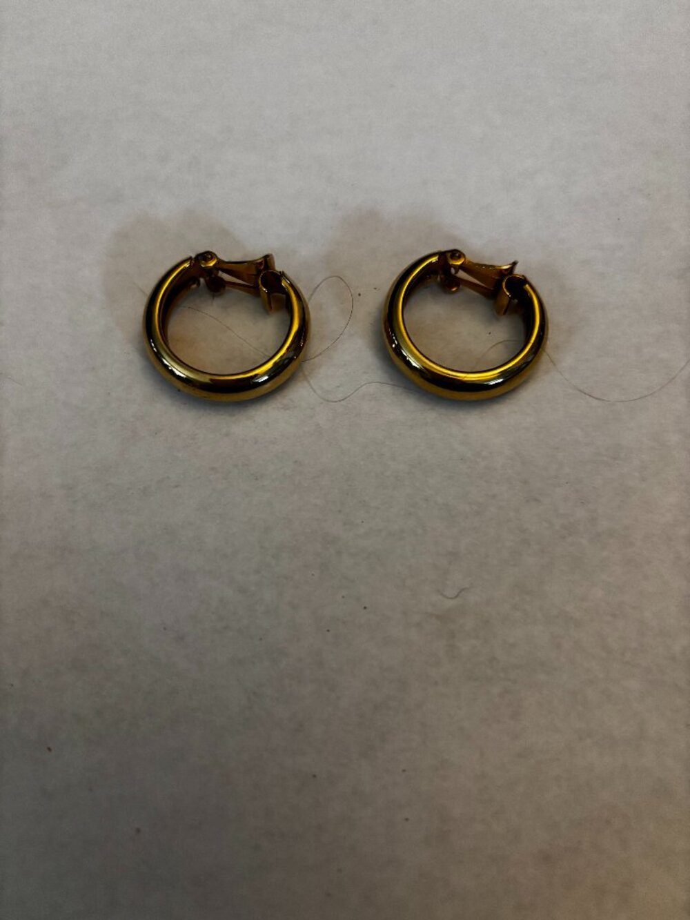 Clip on earrings gold tone hoops